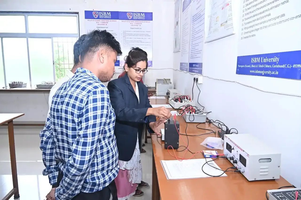 ISBM University science department faculty teaching students in physics lab