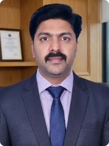 Dr. Santhosh T C M