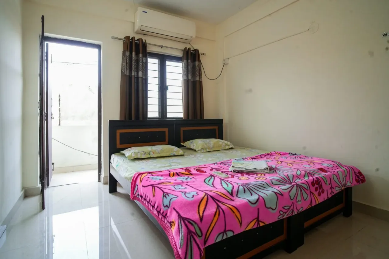 Hostel room with balcony access at Mamata Academy of Medical Sciences, Bachupally
