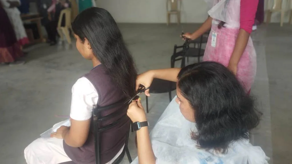 Hair donation for cancer survivors — Nandha College of Nursing