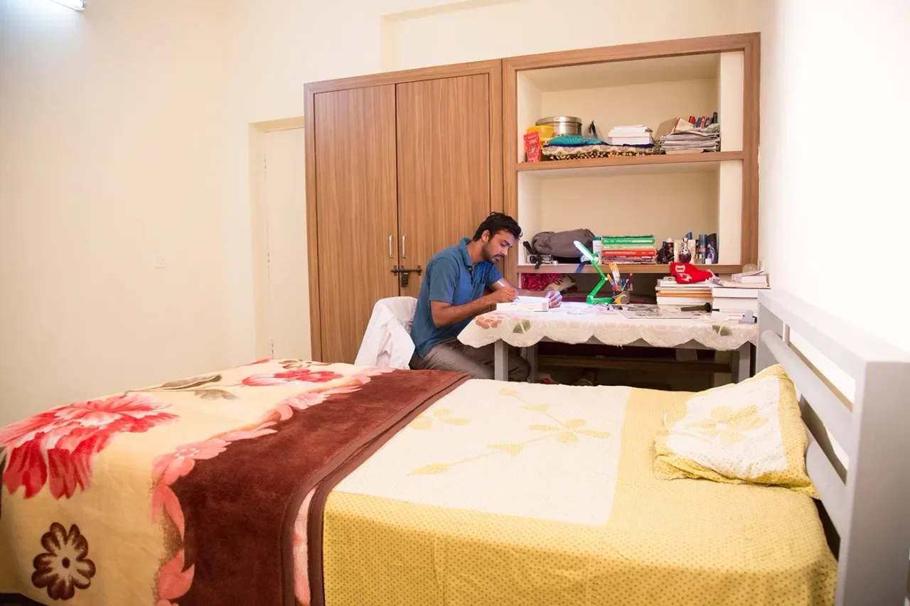 Furnished single hostel room with study desk at the Navodaya campus