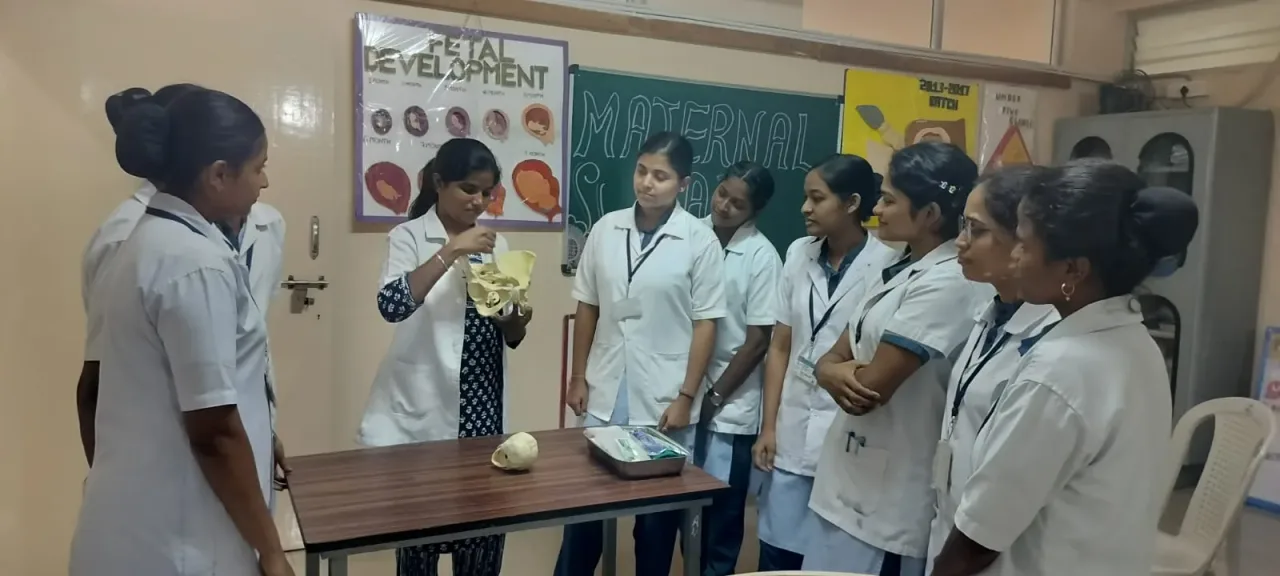 Students attending a nursing skill lab demonstration — Ashwini College of Nursing (Ashwini Institute of Nursing)