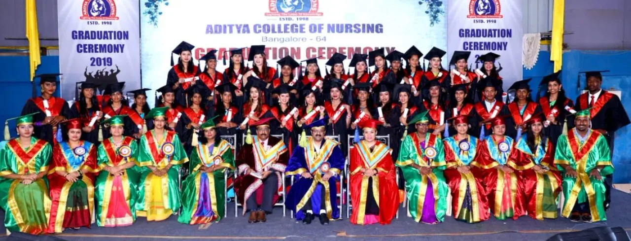 Graduates and faculty posing together during the graduation ceremony — Avishkar College of Nursing