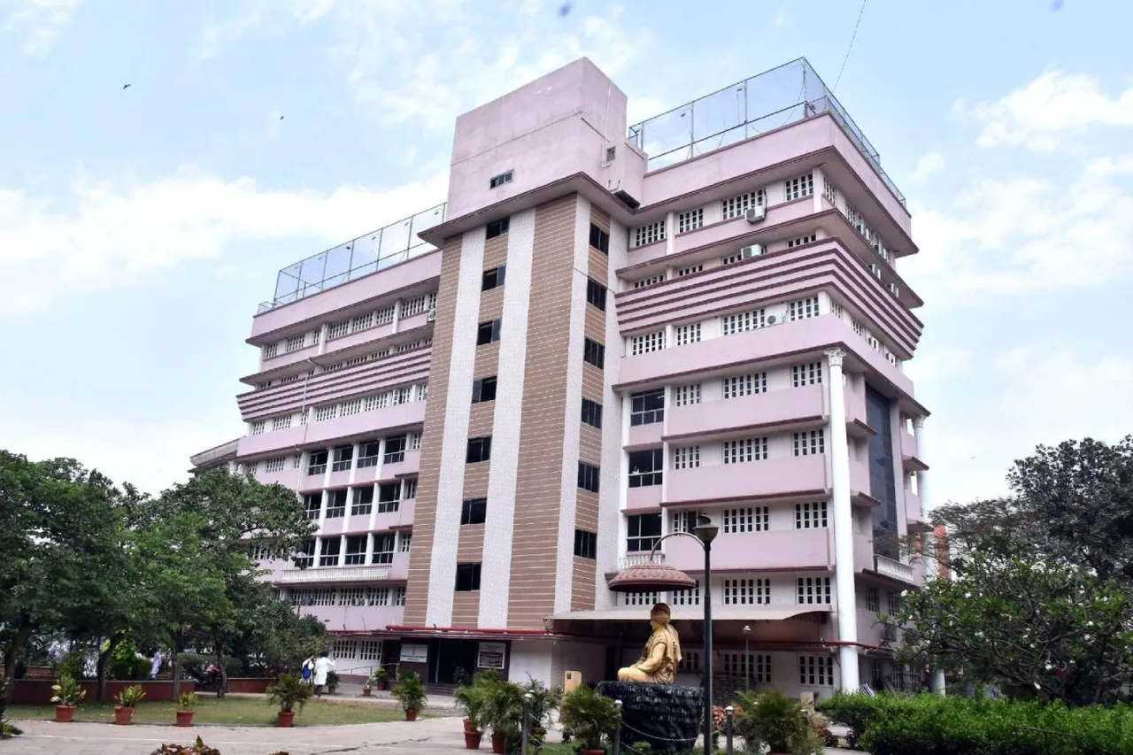 Students using laptops in a classroom — Vivekanand Education Society’s Institute of Management Studies and Research
