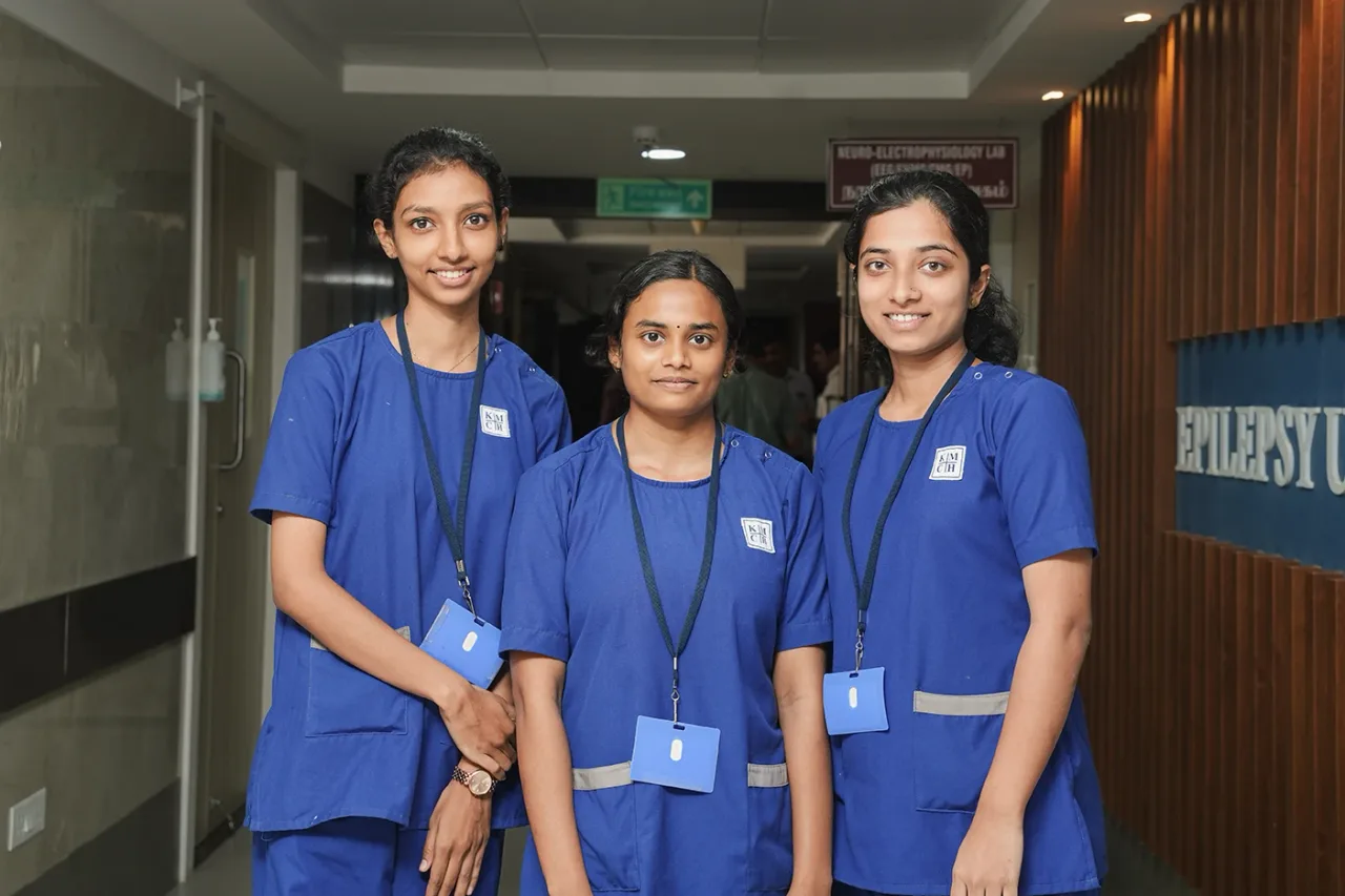 Students outdoors near campus building — KMCH Institute of Allied Health Sciences