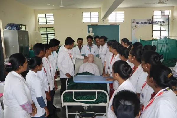 Nursing students observe a clinical demonstration using a patient mannequin — BLDEA's College of Nursing, Tikota