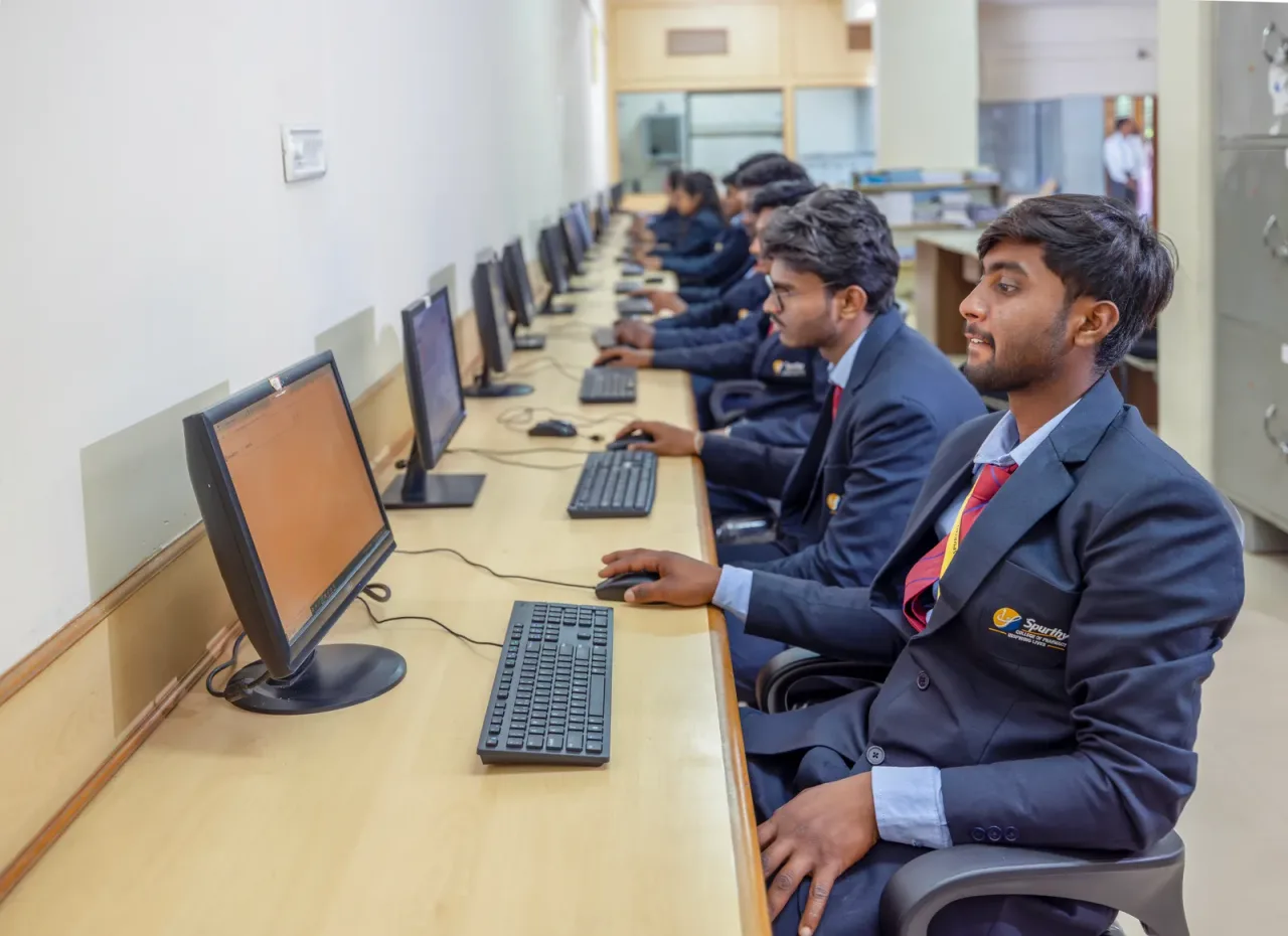 Uniformed students working in the computer laboratory — Spurthy College of Nursing (Spurthy Institutions)