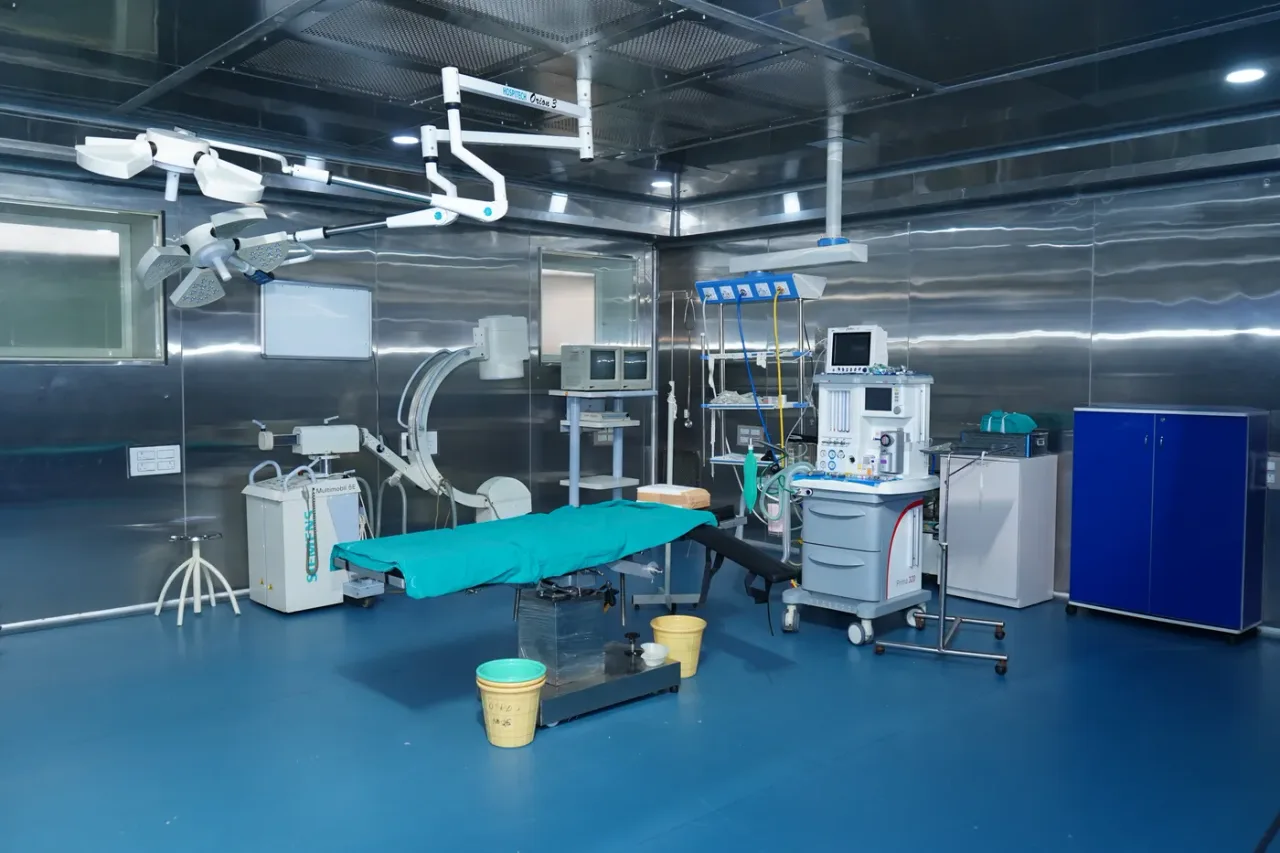 Operation theatre with surgical lights and anaesthesia workstation at Basaveswara Medical College and Hospital, Chitradurga