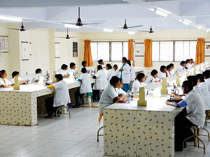 MBBS students using microscopes in the Pathology laboratory at ACS Medical College and Hospital, Chennai