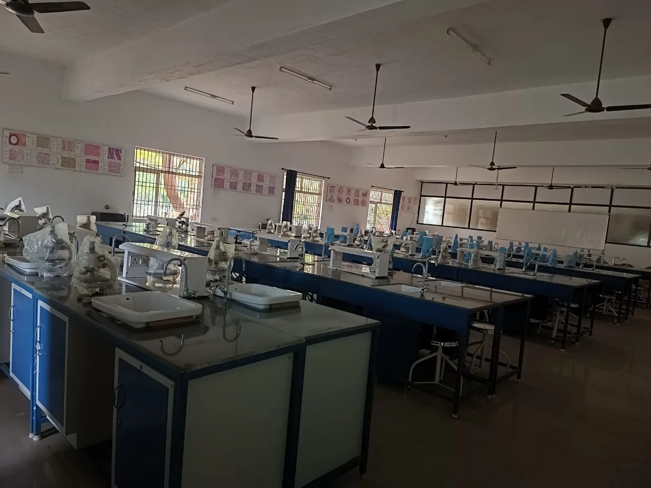 Para-clinical practical laboratory with microscopes and histology charts at Annaii Medical College and Hospital