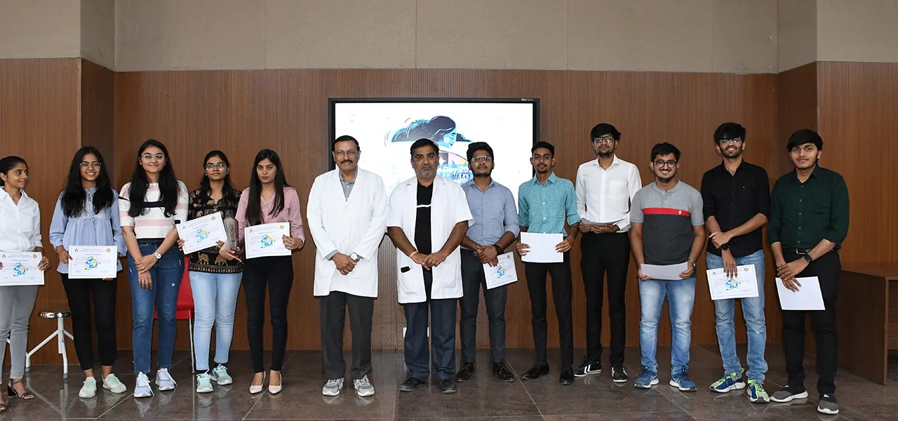 Students receiving certificates with faculty at Banas Medical College & Research Institute, Palanpur