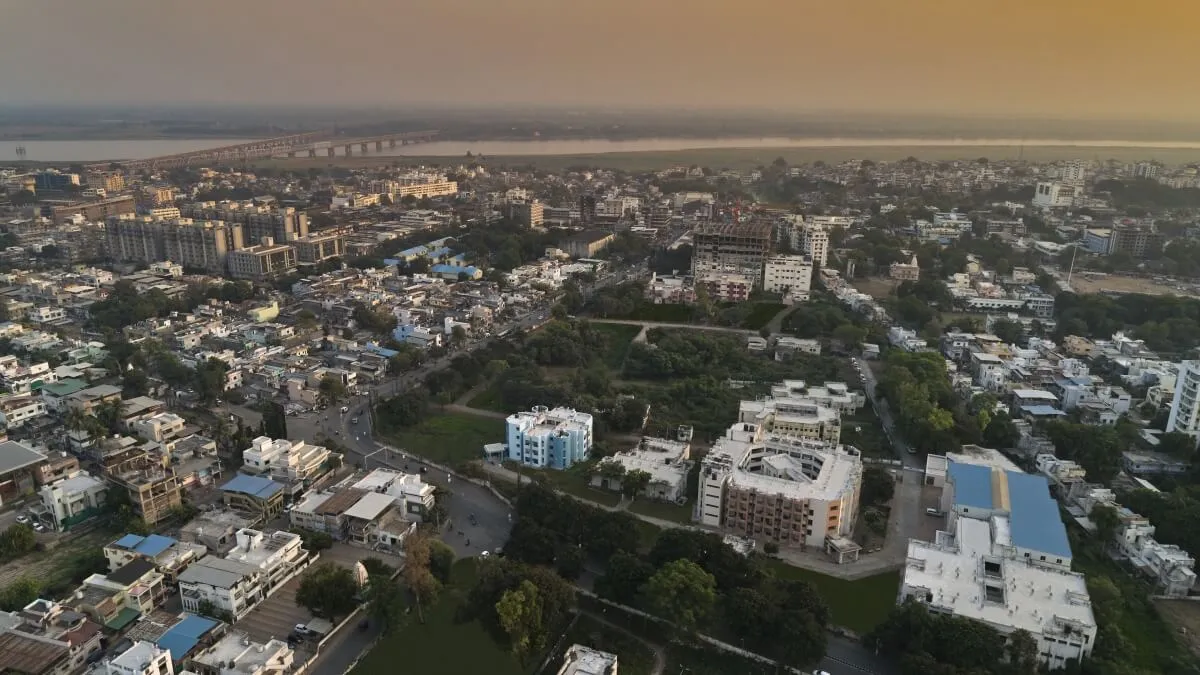 Aerial view of Dr. Kiran C. Patel Medical College and its General Hospital at Bharuch with the Narmada river road-rail bridge in the background
