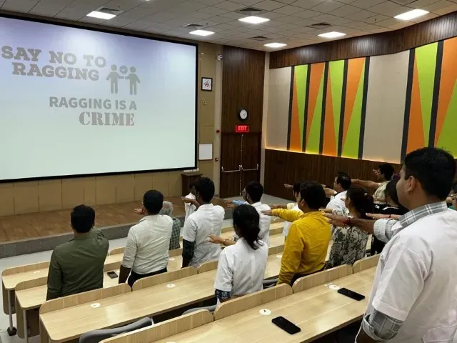 Lecture hall during a student anti-ragging awareness session at Kiran Medical College, Surat