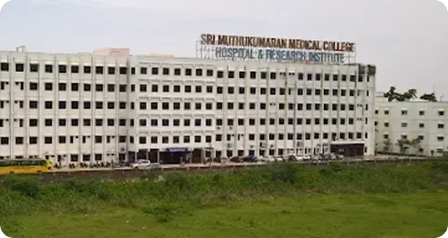 Front facade of Sri Muthukumaran Medical College Hospital and Research Institute, Chennai, with rooftop signage