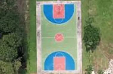 Aerial view of the basketball and sports court on the Sri Muthukumaran Medical College campus, Chennai