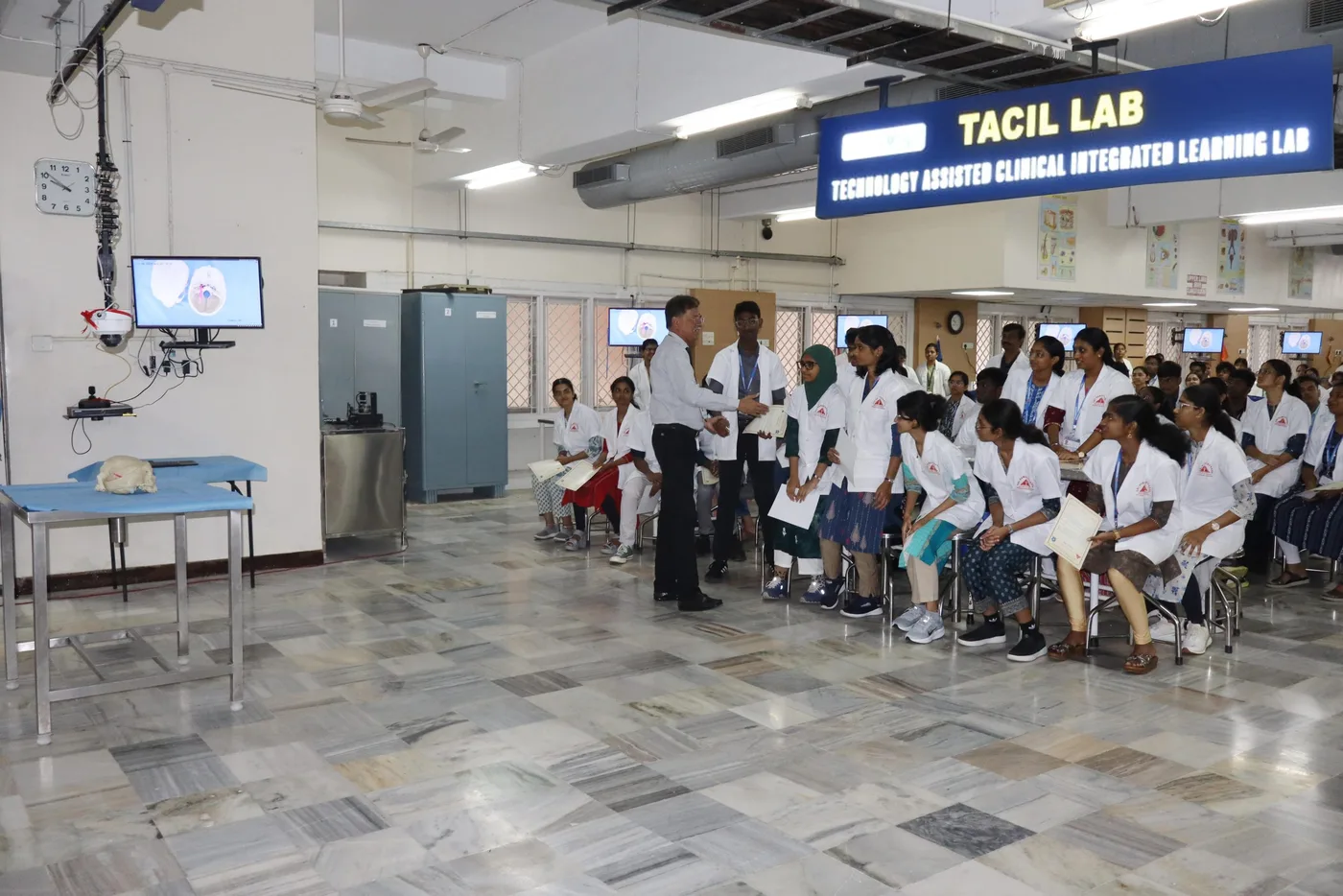 MBBS students in white coats at the Technology-Assisted Clinical Integrated Learning (TACIL) skills lab at Sri Ramachandra Medical College, Chennai