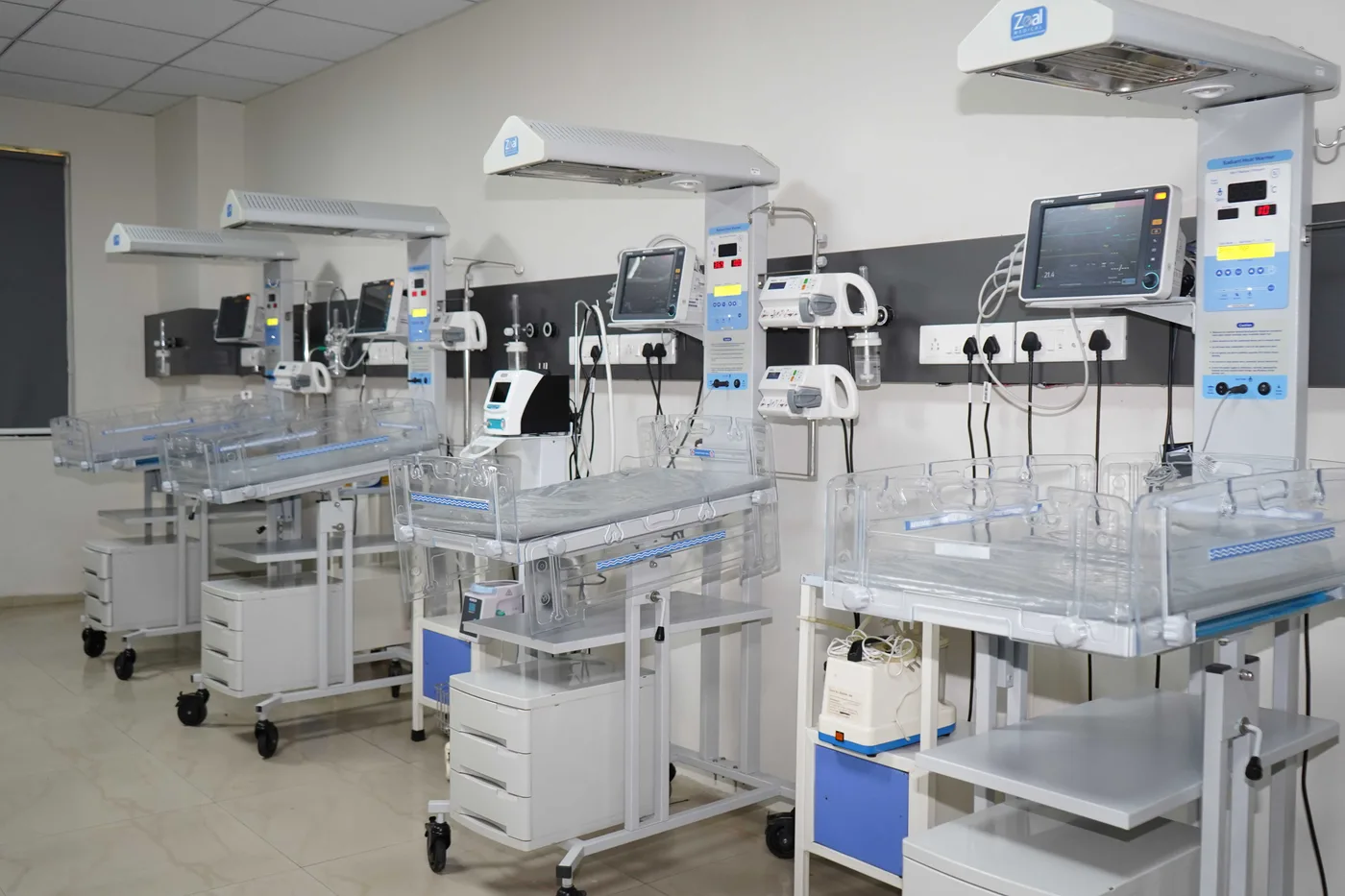 Neonatal intensive care unit with infant warmers at PSM Hospital, the teaching hospital of Swaminarayan Institute of Medical Sciences & Research, Kalol