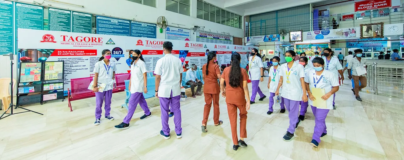 Students and staff in the main lobby of Tagore Medical College and Hospital, Chennai