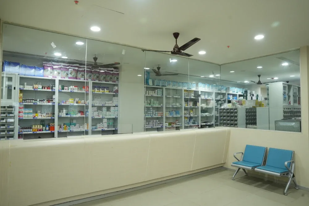 Stocked pharmacy counter at Takshashila Medical College Hospital