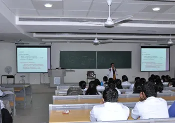MBBS students attending a lecture in a gallery-style lecture theatre at The Oxford Medical College, Bangalore
