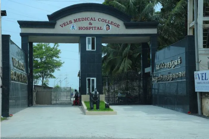Stone entrance archway reading VELS Medical College & Hospital