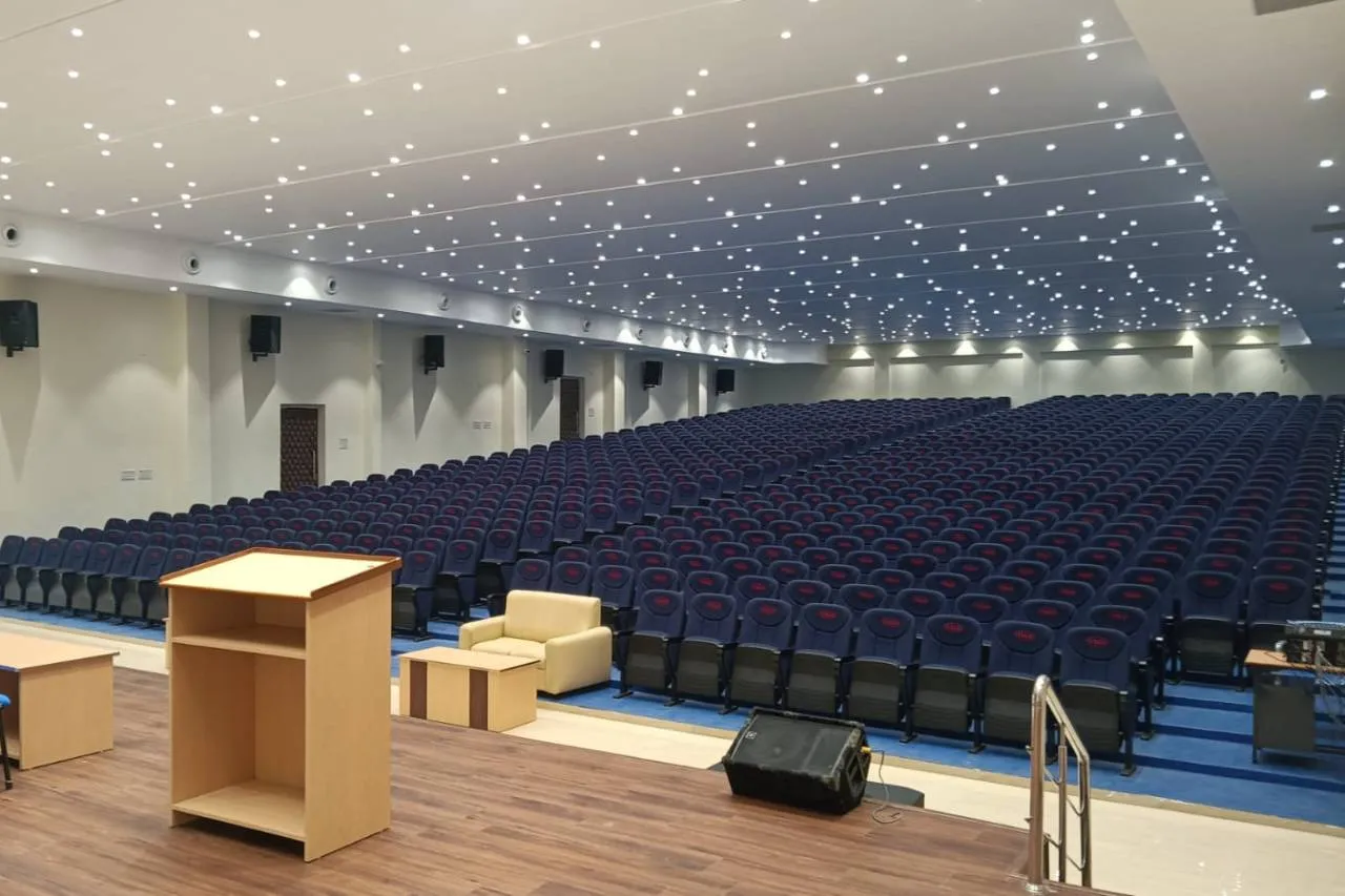 Modern auditorium with tiered seating at VELS Medical College & Hospital